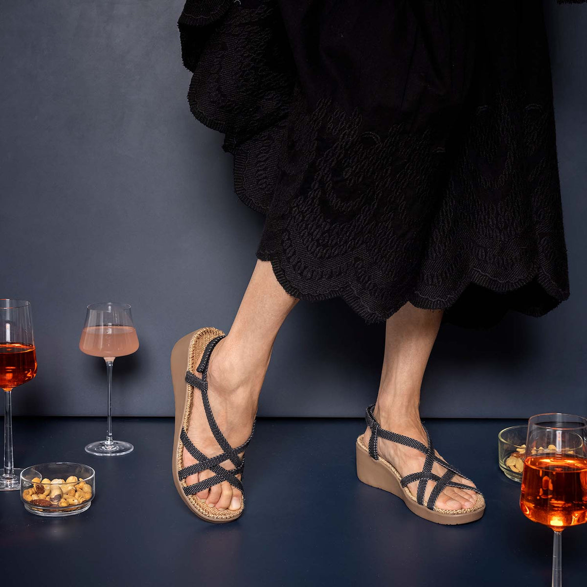 Shangies Women#3 wedge sandals in Moonlight Dance worn with a black outfit