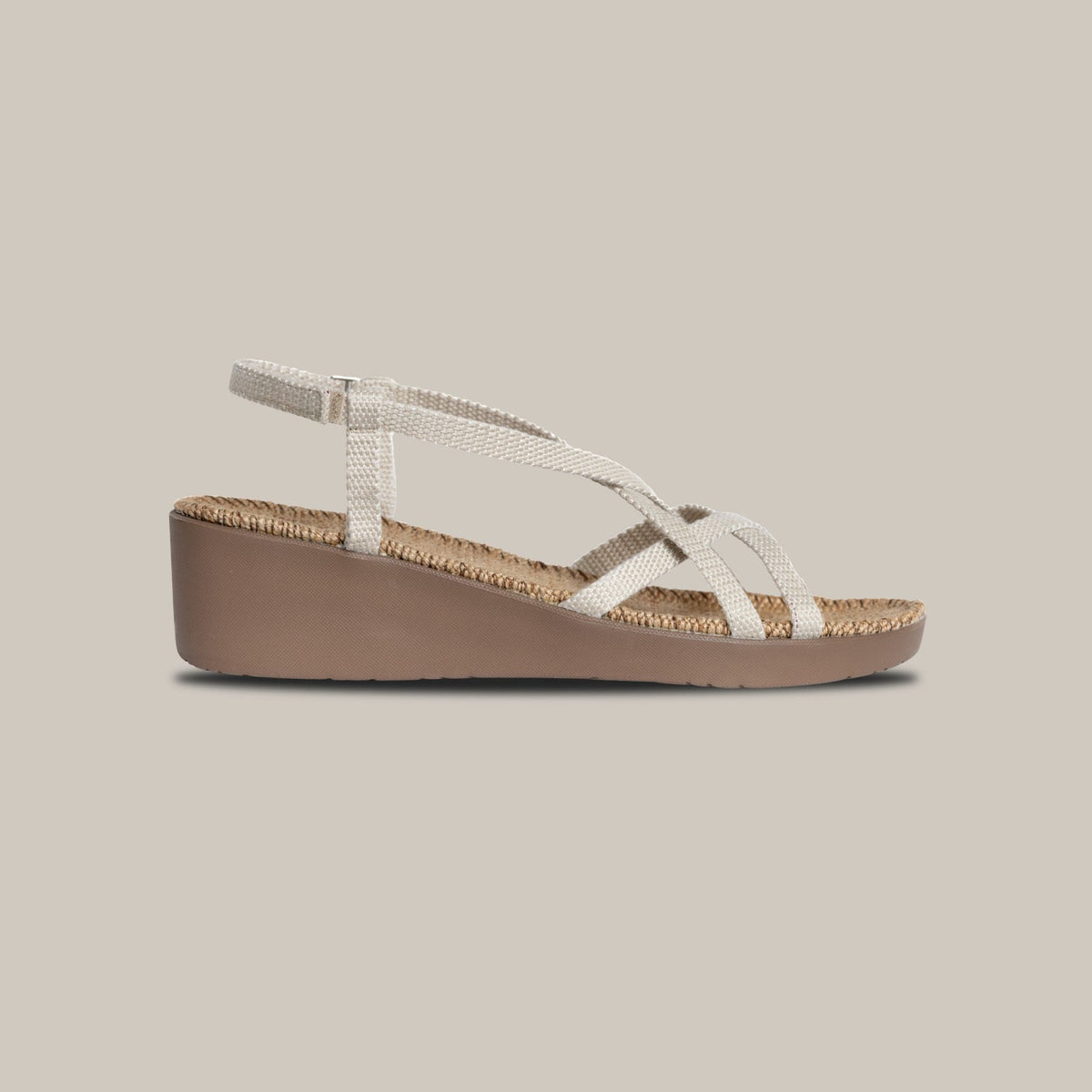 Side view of a Shangies Women#3 wedge sandal in Jazzy Cloud against a beige background